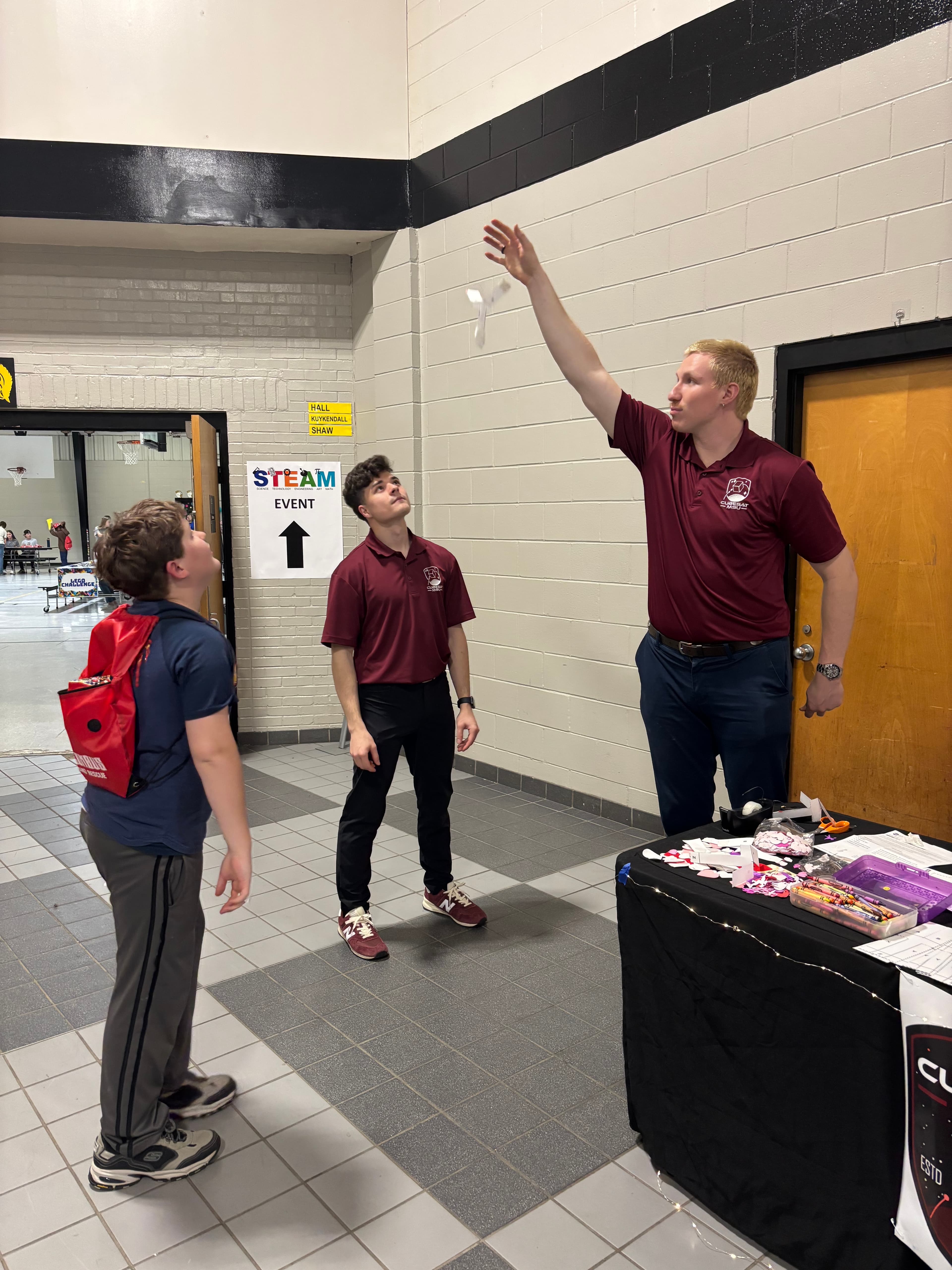 Students learning about CubeSats